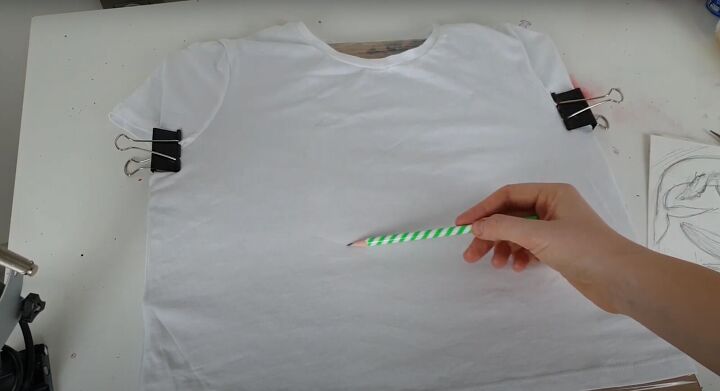 how to paint watercolor designs on a shirt creating art on clothes, Using a pencil to sketch