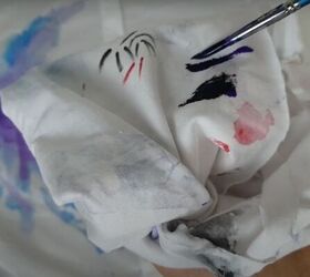 how to paint watercolor designs on a shirt creating art on clothes, Dabbing excess water with a cloth