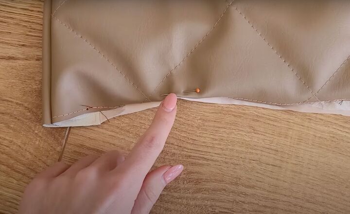 how to make a sleeveless jacket that s perfect for fall, Hemming the raw edges