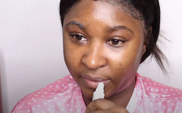 how to do a clean girl makeup look easy natural looking makeup, Applying hydrating lip balm