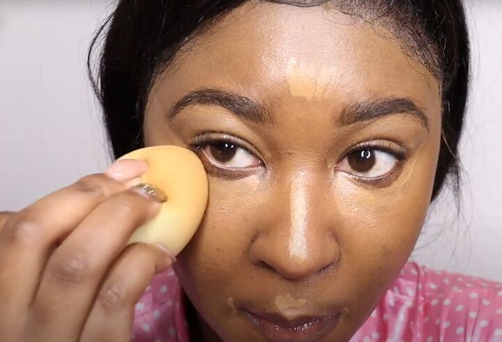 how to do a clean girl makeup look easy natural looking makeup, Blending concealer with a makeup sponge