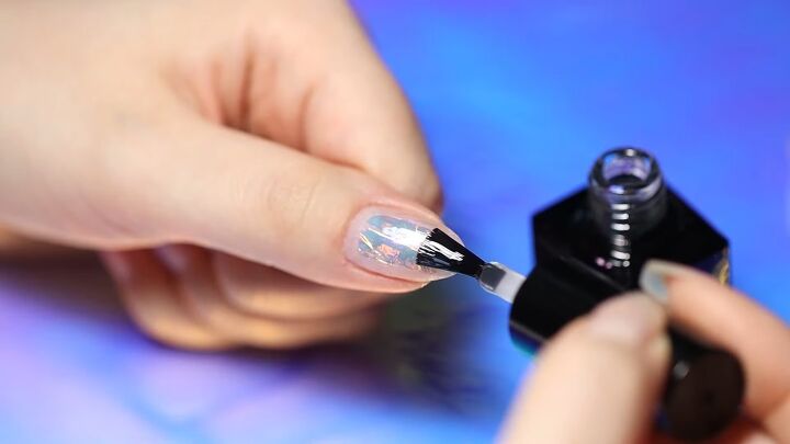 how to do mesmerizing aurora ice korean nail art 3 ways, Applying a top coat
