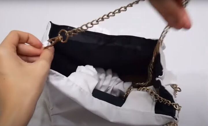how to sew a mini bag with scrunchie handles a chain strap, Hooking a chain strap onto the chain loops
