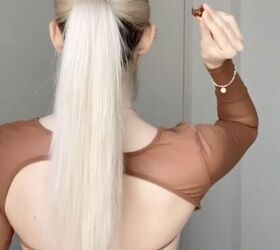 After seeing this simple ponytail hack, we're never going to tie our hair the same way again
