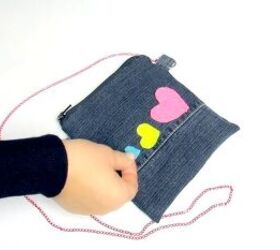 7 quick and easy steps to the cutest no sew denim shoulder bag, Gluing felt hearts to the finished denim bag