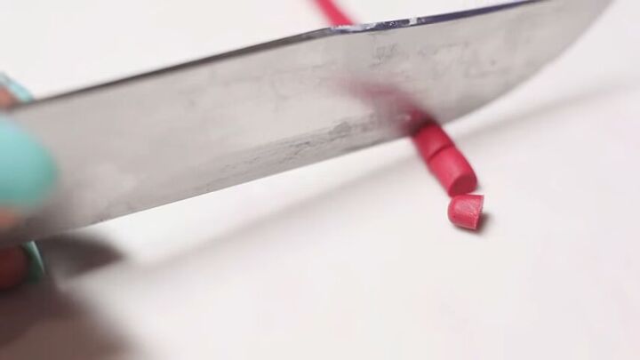 red blood cells in an adorable tiny bottle tutorial, Using a blade to cut clay rope