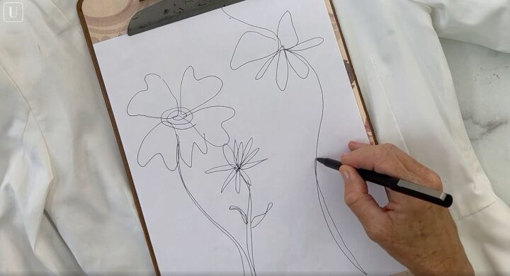 how to paint on fabric and create a one of a kind jacket, Sketching out a floral design