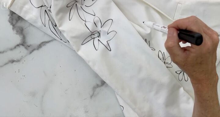 how to paint on fabric and create a one of a kind jacket, Folding sleeve to find center point