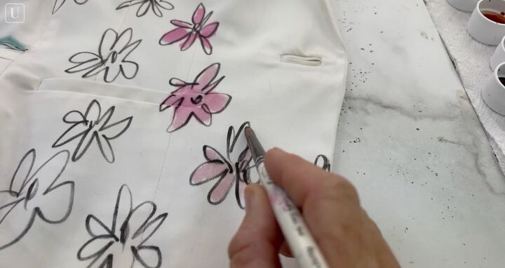 how to paint on fabric and create a one of a kind jacket, Adding more blank flowers with fabric marker