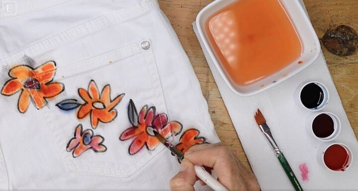 how to paint on fabric and create a one of a kind jacket, Layering dye on flowers with a paintbrush