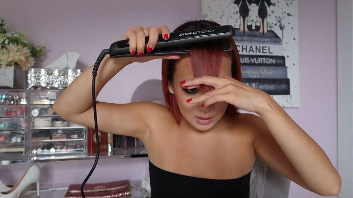 how to perfectly cut your own bangs at home in 4 simple steps, Styling bangs with a flat iron
