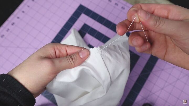 how to make a blouse with frills out of an old men s dress shirt, Pulling the thread to gather the sleeves