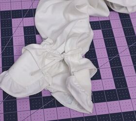 how to make a blouse with frills out of an old men s dress shirt, Tying a bow on the end of the sleeves