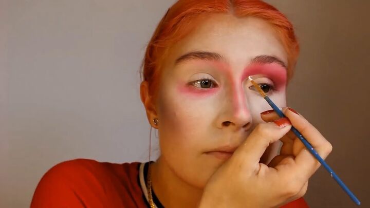 how to do a fun mad hatter makeup look for halloween, Drawing a line in creamy white eyeshadow