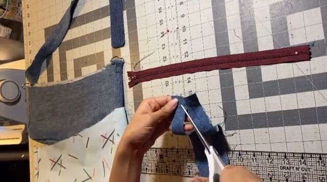 how to make a stylish upcycled shoulder bag, Cutting out the zipper placket