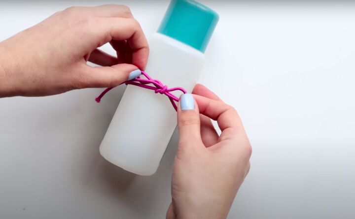 how to make 5 fun hair ties that double as bracelets, Wrapping elastic around bottle