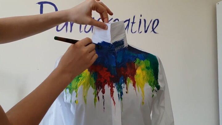 how to make a colorful rainbow inspired diy dripping paint shirt, Painting under the collar