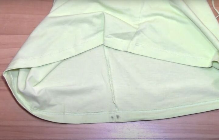 how to transform a t shirt into a drawstring skirt, Cutting the fabric