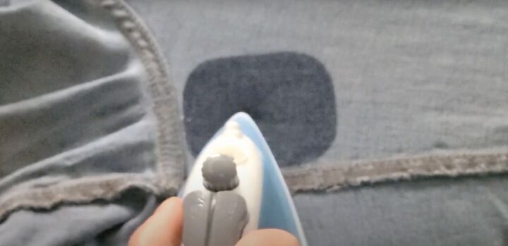 2 easy steps to fix holes in jeans inner thighs, Ironing the patch