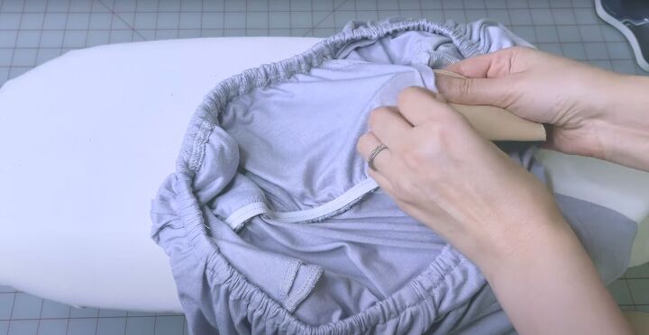 learn how to make a beautiful empire waist casual dress, Inserting bra cup
