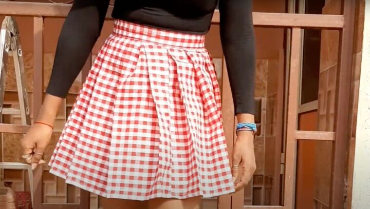 4 comprehensive steps to sewing a fun and flirty red pleated skirt, Completed red pleated skirt