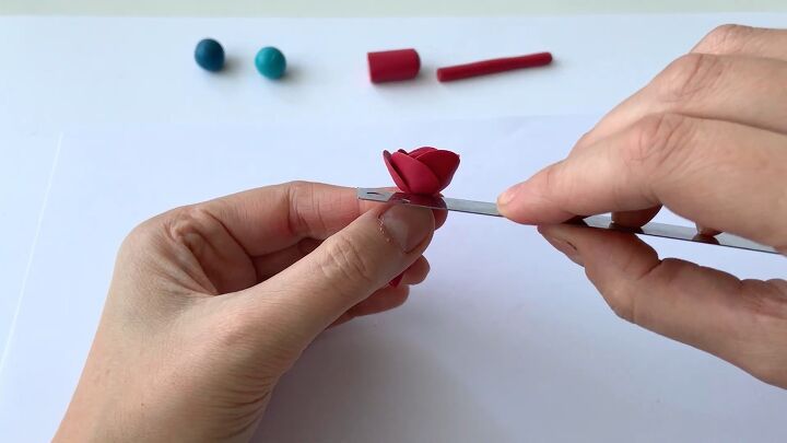how to make beautiful colorful clay flowers, Cutting the top part of the flower