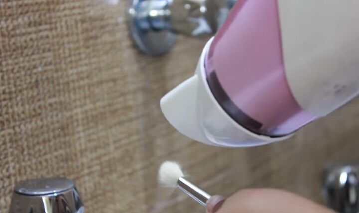 effective tips on how to wash and dry wet makeup brushes fast, Blow drying makeup brush