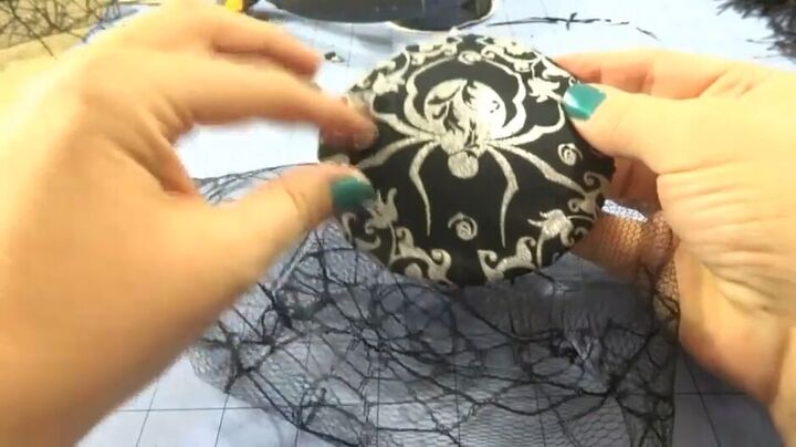 how to create an elegant halloween fascinator, Laying the netting onto the hat