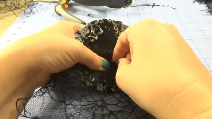 how to create an elegant halloween fascinator, Sewing on the netting