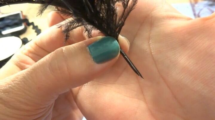 how to create an elegant halloween fascinator, Tip of feather cut at angle