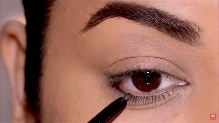 how to create stunning eyeliner looks for hooded eyes, Applying eye pencil