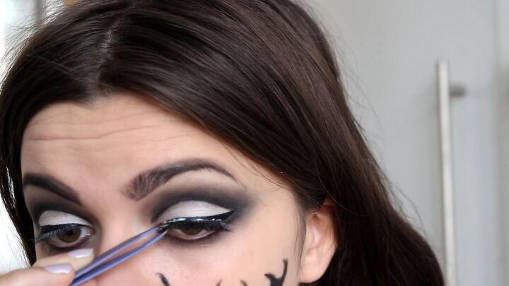how to create a creepy demon costume for halloween, Adding false eyelashes