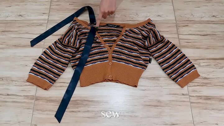 cute and easy diy cardigan upcycle, Strap pinned to DIY cardigan