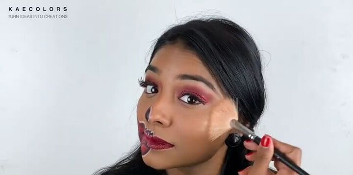 how to do glamorous red skull makeup for halloween, Adding highliter