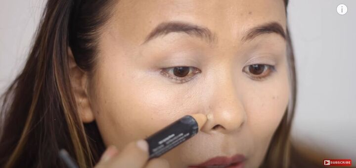 6 effective tips on how to use concealer correctly, Applying concealer to zit