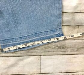 how to easily create stylish pant cuffs with a simple sewing hack, measuring raw edge of jeans hem for our simple sewing hack
