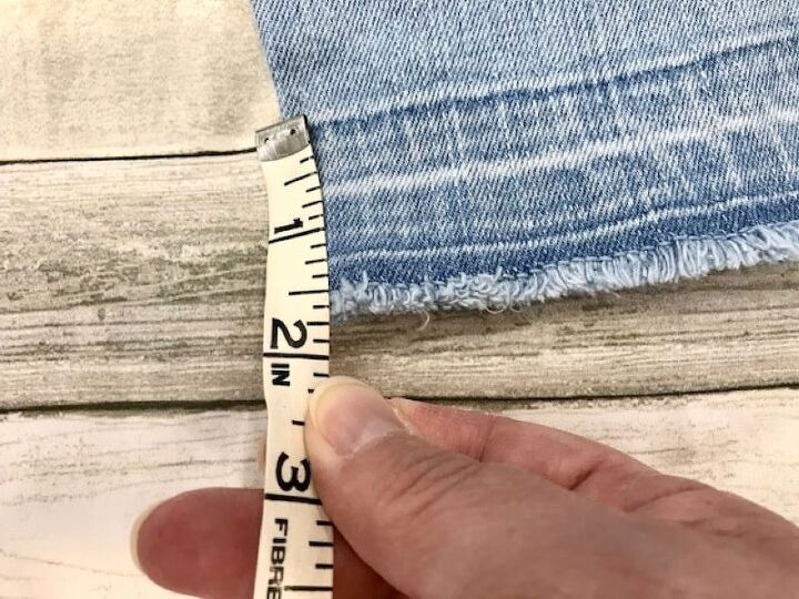 how to easily create stylish pant cuffs with a simple sewing hack, Second measurement of jean hem