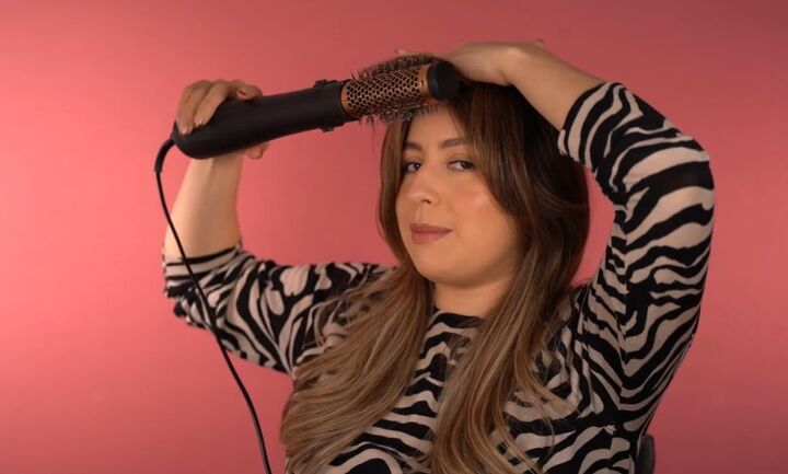 everything you need to know to make fake bangs look super cute, Using hot brush on fake bangs