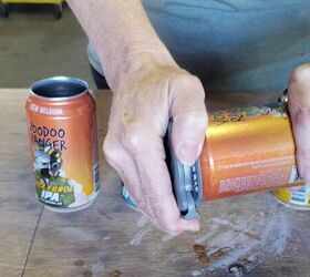 Use 2 empty soda cans for this clever Halloween idea