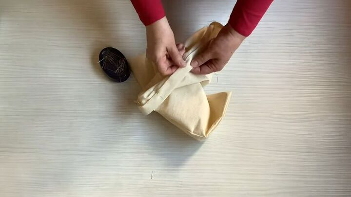 how to make a super cute and sustainable tote bag, Folding and pinning fabric