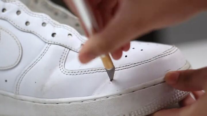 sneakers diy how to transform old shoes, Punching holes with knife