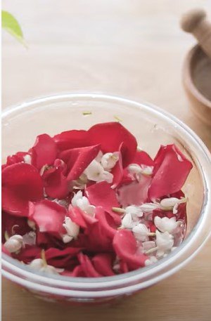 how to make jasmine and rose water for super shiny hair, Mixing the petals and water