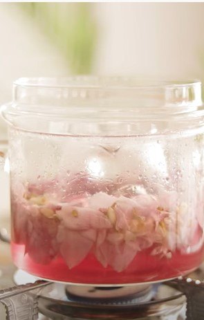 how to make jasmine and rose water for super shiny hair, Slow boiling the mixture
