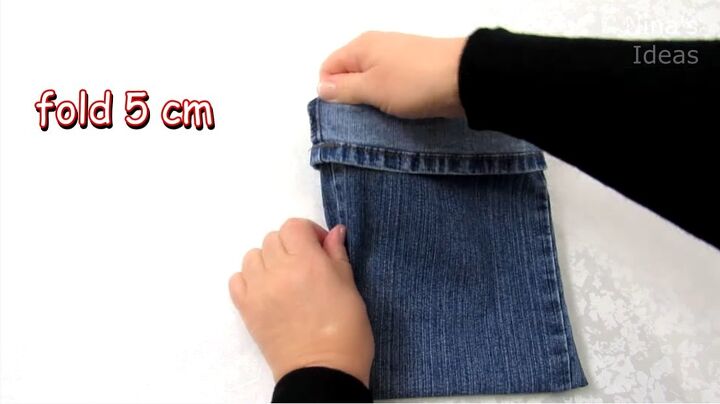 how to make a purse out of jeans in 4 super cute and easy ways, Folding the fabric