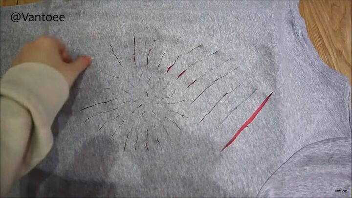 how to create an awesome diy fossil t shirt, Cutting slits
