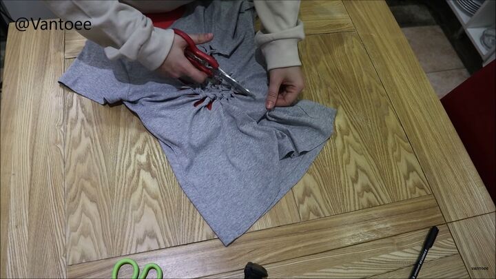 how to create an awesome diy fossil t shirt, Elongating the slits