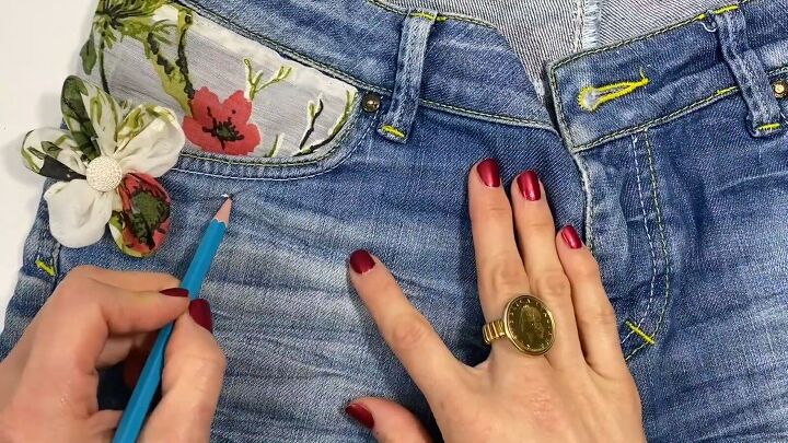 fun upcycle tutorial how to embroider old jeans, Covering any imperfections with embroidery