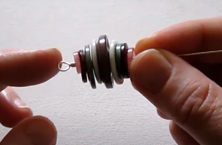how to diy a cute and easy button necklace, Adding buttons to wire