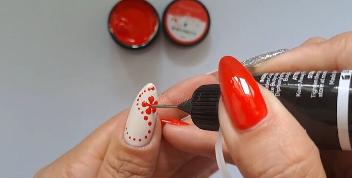 nail art tutorial cute and easy red flower nails, Adding rhinestones