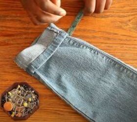 easy sewing hack for when your jeans are too long, Pinning it in the place